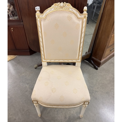 1629 - A painted white high back chair with gold painted highlights