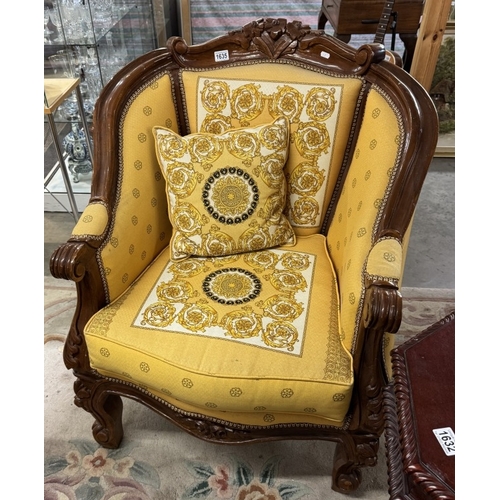 1635 - A classic style wing armchair