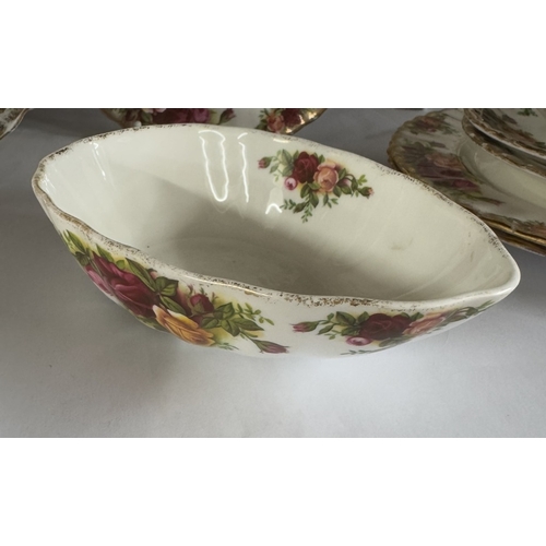 1527 - A quantity of Royal Albert Country Rose dinner items