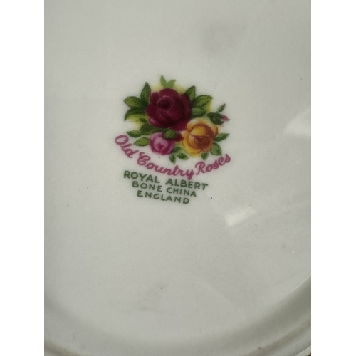 1527 - A quantity of Royal Albert Country Rose dinner items