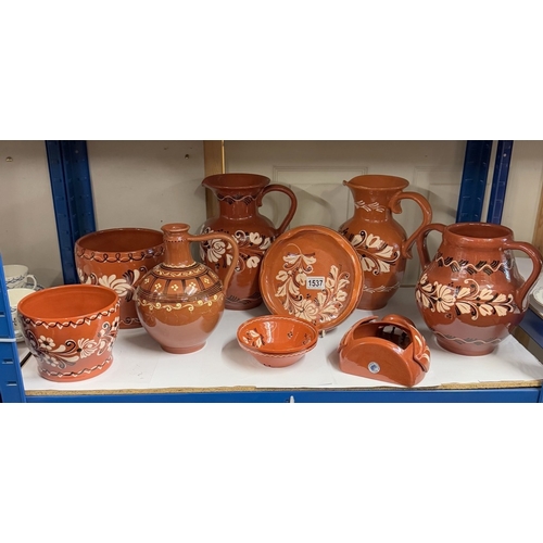 1537 - A quantity of terracotta including vases & planters etc