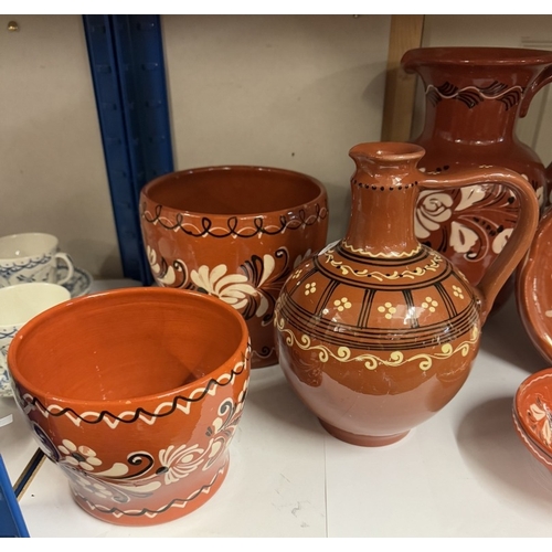 1537 - A quantity of terracotta including vases & planters etc