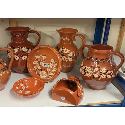 1537 - A quantity of terracotta including vases & planters etc