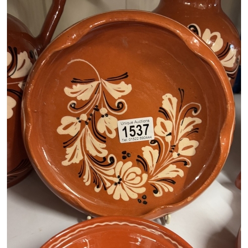 1537 - A quantity of terracotta including vases & planters etc