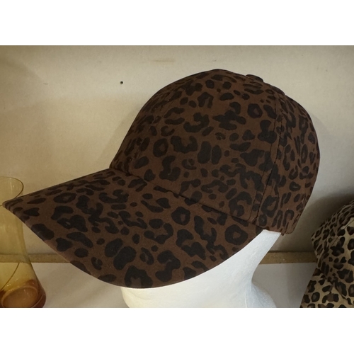 1560 - 2 animal print caps