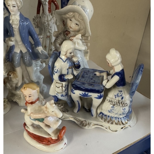 1567 - A quantity of Continental ceramic figures including blue & white