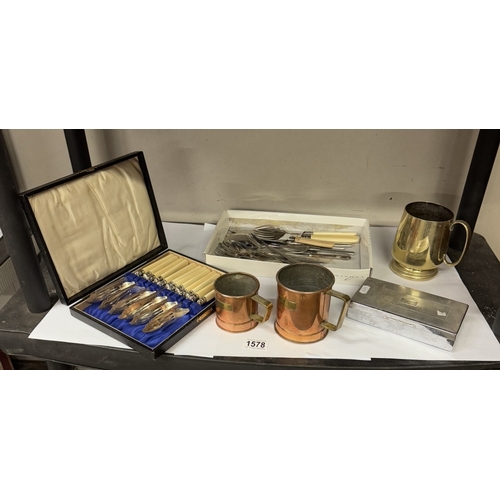 1578 - A mixed lot including cutlery & copper measures etc.