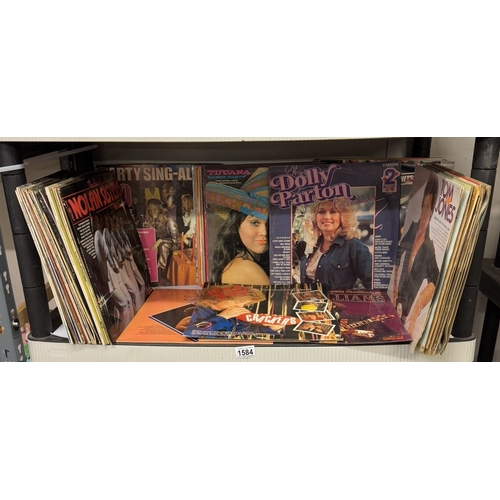 1584 - A quantity of LP's including Slade, Nolan Sisters, Tom Jones & Dolly Parton etc.