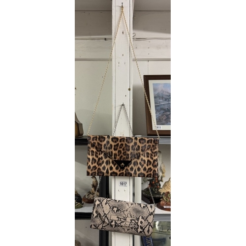 1617 - A ladies faux snake skin shoulder bag & an animal print shoulder bag