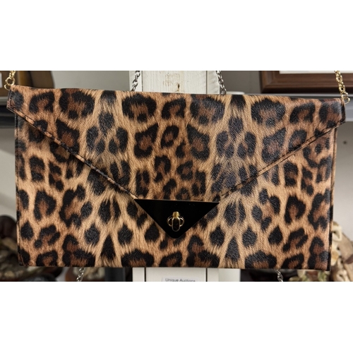 1617 - A ladies faux snake skin shoulder bag & an animal print shoulder bag