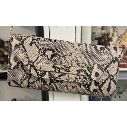 1617 - A ladies faux snake skin shoulder bag & an animal print shoulder bag