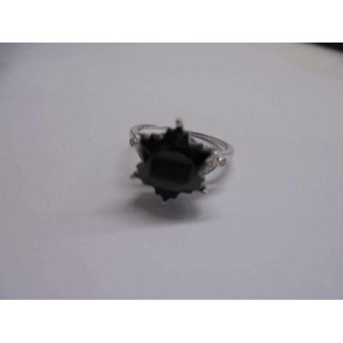 1001 - A 9ct white gold ring set large black stone, size M, 2.99 grams.