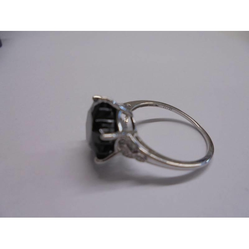 1001 - A 9ct white gold ring set large black stone, size M, 2.99 grams.