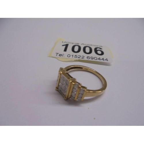 1006 - A 9ct gold square design diamond ring, size P, 2.93 grams.