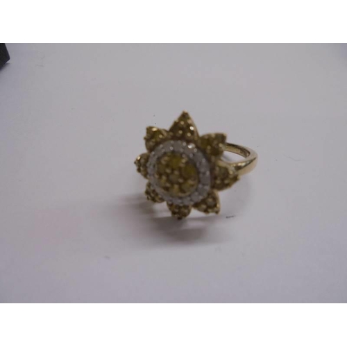 1010 - A 9ct yellow gold floral ring, size N, 4.06 grams.