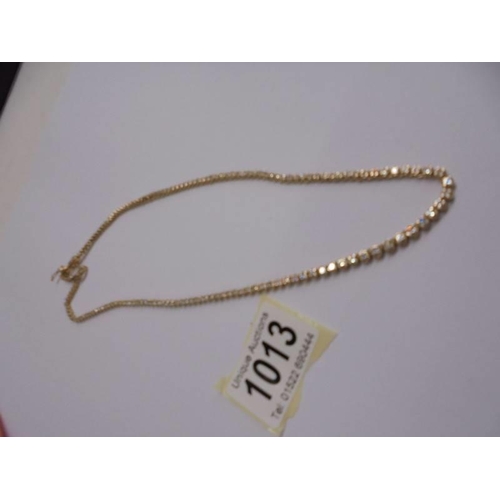 1013 - A yellow gold 5.4 carats diamond necklace, 18.56 grams.