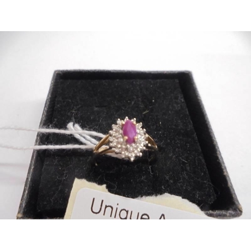 1014 - Ayellow gold ruby and diamond ring, size L, 1.78 grams.