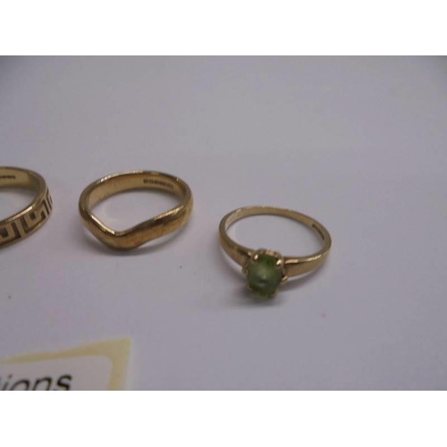 1019 - Four 9ct gold rings set gemstones, 9.5 grams.