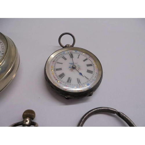 1024 - An old pocket watch, two silver fob watches and watch keys.