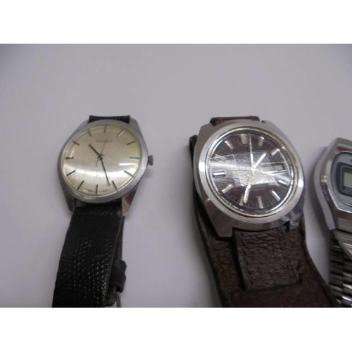 1025 - Four vintage gent's wrist watches.