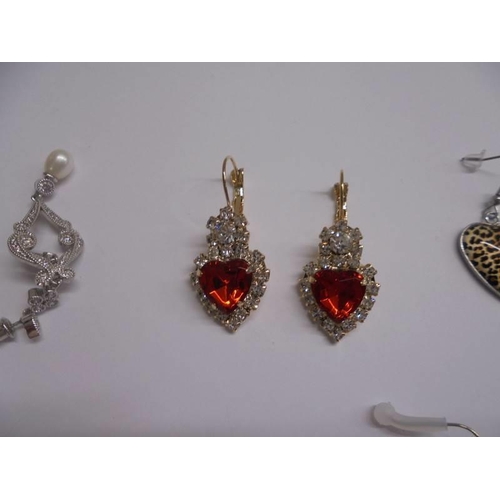 1029 - Nine pairs of good quality fashion earrings.