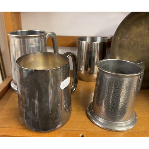 1635 - A quantity of silver plate tankards etc.