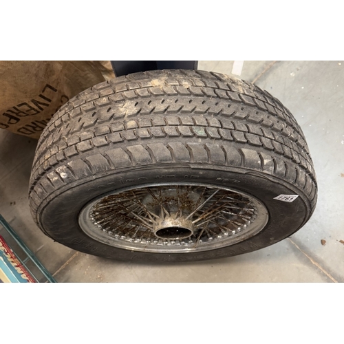 1761 - A used chrome 15'' wire wheel with tyre