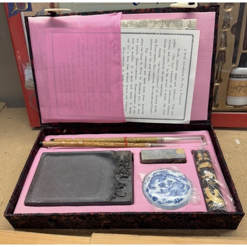 1801 - A Chinese boxed writing set, Boxed readers digest calligraphy set & book