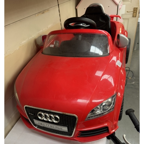 1834 - A Childs Audi RS TT Plus electric sit in car (Needs battery & leads)