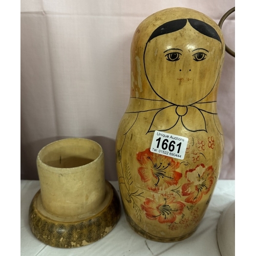 1661 - A large wooden Russian doll bottle holder