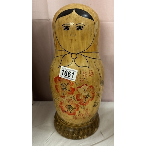 1661 - A large wooden Russian doll bottle holder