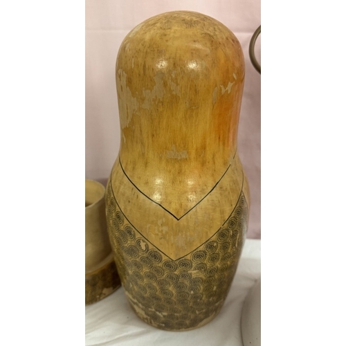 1661 - A large wooden Russian doll bottle holder