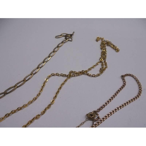 1035 - Three 9ct gold chains, 6.97 grams.