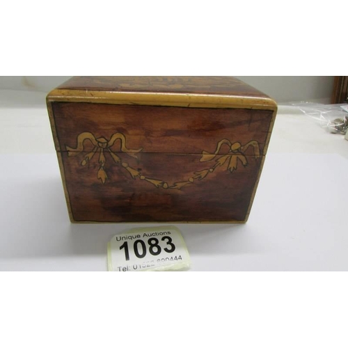 1083 - A nice inlaid playing card box with cards.