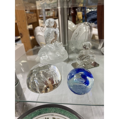 1744 - A quantity of paperweights, perfume bottles etc including Waterford, Stuart crystal, Humppila Finlan... 