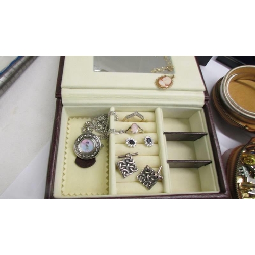 1116 - A mixed lot including silver ring, silver earrings, cameo pendant, cuff links and tie pins etc.,