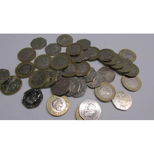 1120 - A good collection of 26 £2 coins with different designs and 16 50 pence coins.