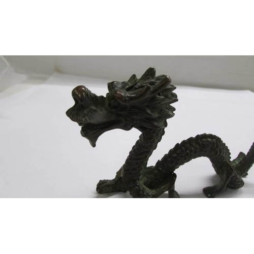 1121 - A Chinese bronze dragon.