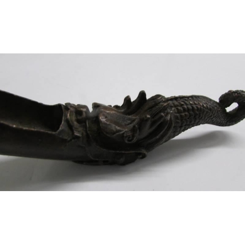 1122 - A signed Chinese bronze feeding spoon.