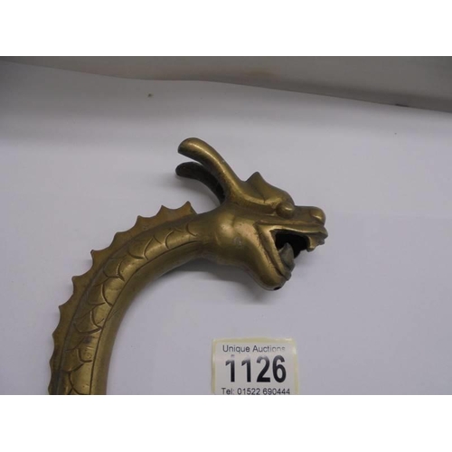 1126 - A Tibetan brass dragon.