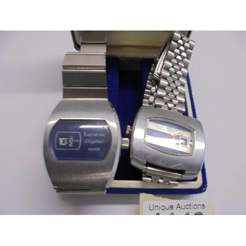 1143 - Two vintage jump hour digital watches, both a/f.