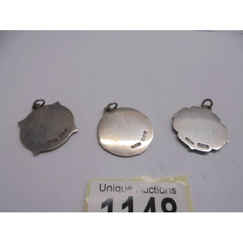 1148 - Two silver watch fobs featuring harps and another silver watch fob.