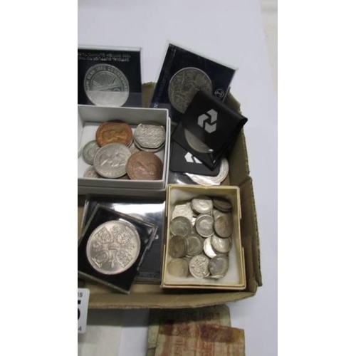 1165 - A quantity of coins including silver threepenny bits, £5 coins, 50p coins etc.,