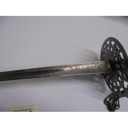 1183 - A steel court sword with beaded hilt and faceted stud decoration.