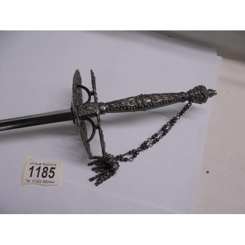 1185 - A steel court sword with beaded hilt and faceted stud decoration.