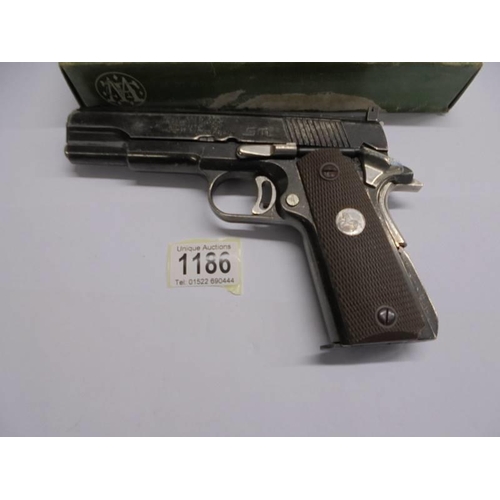 1186 - A Colt Gold Cup Government model No. 21 .45 calibre automatic pistol with box lid.