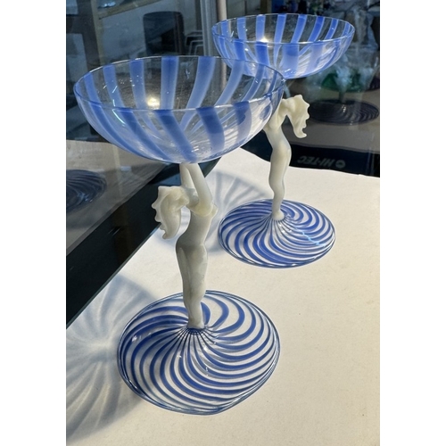 1245 - An art deco glass & decanter set with blue swirls & nude figurine stems