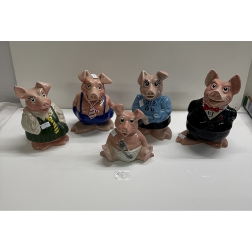 1246 - A quantity of Wade Nat West pig money boxes