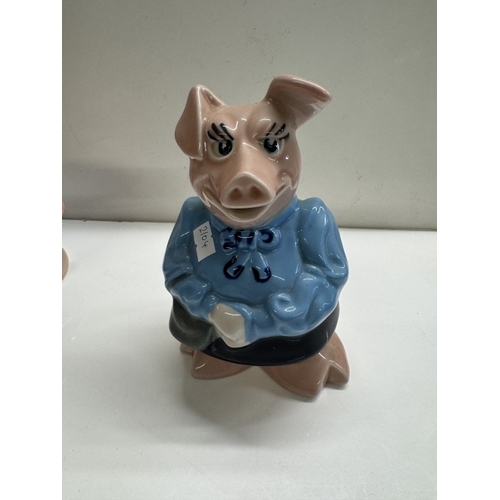 1246 - A quantity of Wade Nat West pig money boxes