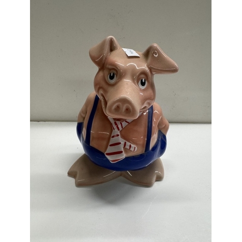 1246 - A quantity of Wade Nat West pig money boxes